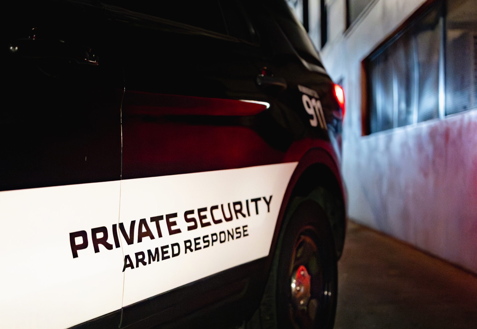 Plainclothes close-protection officer at night