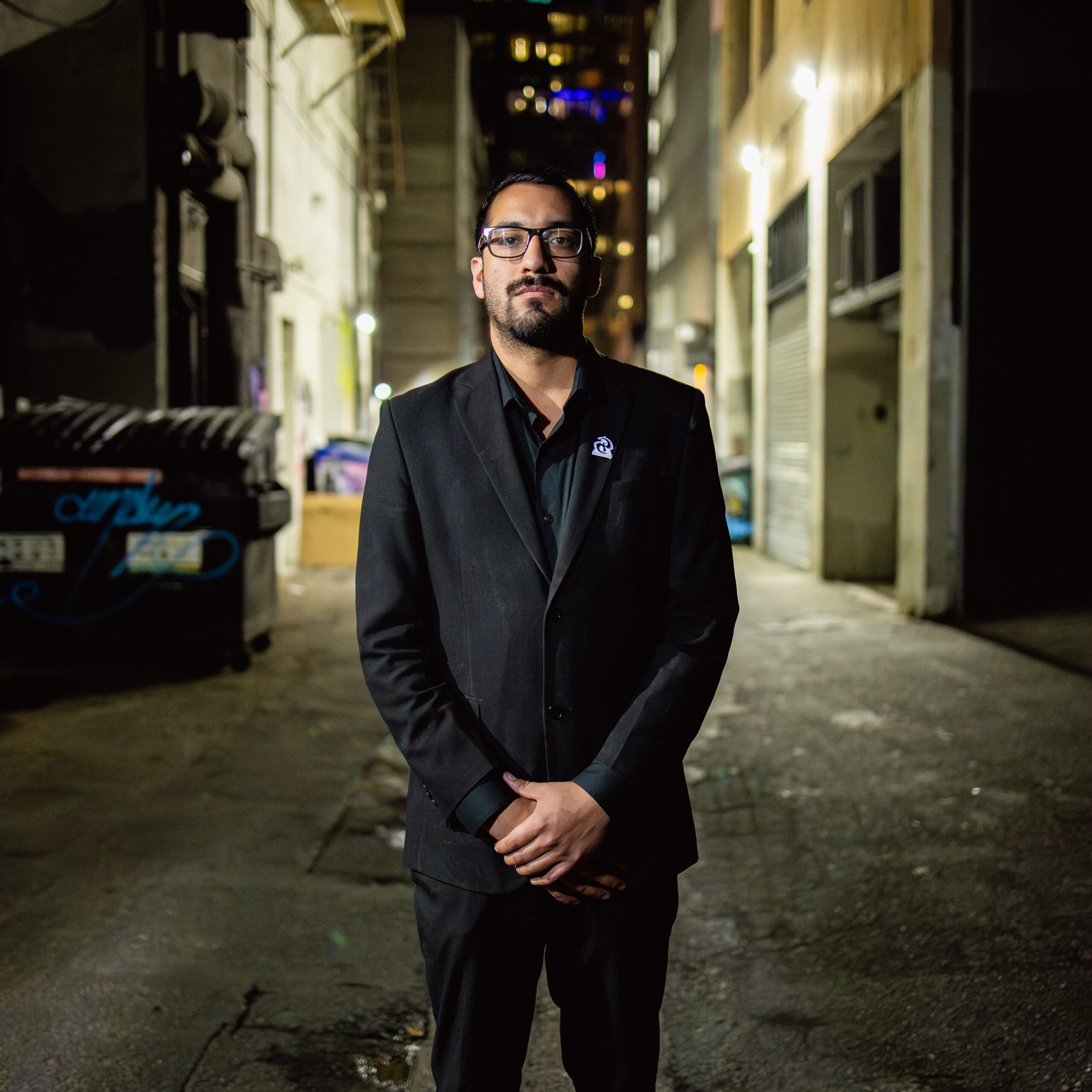 Valcor Security officer in a downtown business district at night